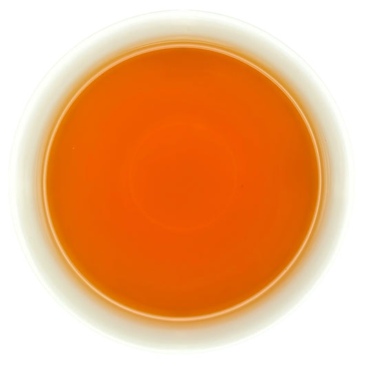 the golden-red liquor of yunnan black tea