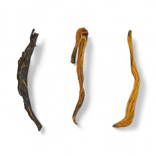 close up of 3 leaves of golden monkey (jin jun mei) tea