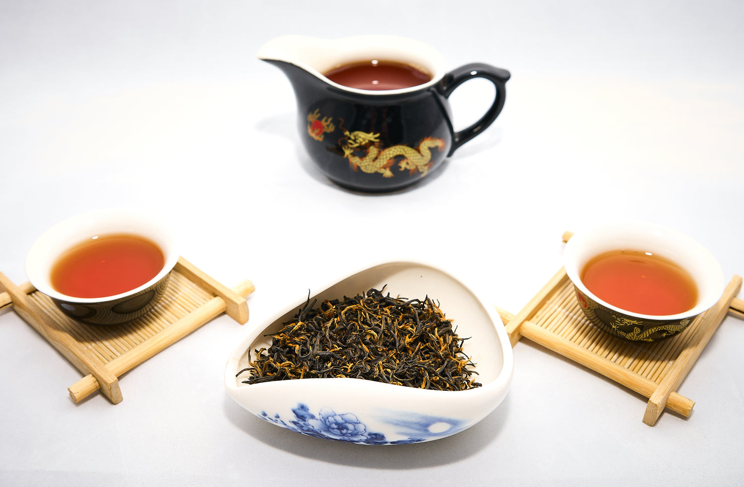 golden monkey tea being served with the dried leaves presented